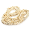 Macro view of irregular beige shell gravel beads for DIY jewelry making and craft projects - 8*5mm (Approx. 220 Pcs) / White Coral Chips