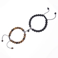 Detail of magnetic heart clasp connecting tiger eye and black matte stone bead bracelets - Yellow Tiger Eye + Matte Stone
