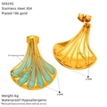 Detail view of 18K gold plated fan-shaped earrings with turquoise oil dripping process - Green