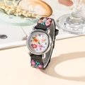 Detailed view of children's quartz watch featuring 3D butterfly silicone strap and floral dial - Black