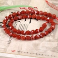 Detail von facettierten roten Achatperlen mit polierter Oberfläche für DIY-Schmuck - 8mm / Rot