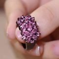 Exquisite black metal ring featuring vibrant purple gemstone flower design for women - US 7 / Black Gold/Purple