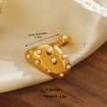 Gold vintage irregular stainless steel ring with white pearls on beige silk fabric - Vintage Irregular Multi-Pearl Style (ZN1503-1121)