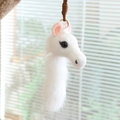 Portachiavi peluche testa di pony bianco con morbida pelliccia e cinturino intrecciato - Bianco