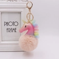 Detail of pink glitter unicorn keychain with beige plush pom pom and gold hardware - Unicorn (Gold Chain Buckle) / Nude