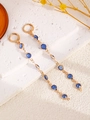 Elegant gold drop earrings featuring multiple blue gemstones on a long delicate chain - Blue Round Earrings (6652)