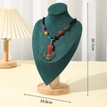 Green velvet mannequin necklace display stand with light wood base and dimension markers - L Green