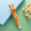 Yellow multi-color retractable ballpoint pen with a 3D cartoon tiger and apple motif - Tiger - Dream Come True