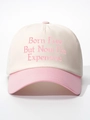 Détail de la broderie Born Free sur une casquette en coton bicolore blanc cassé et rose - Blanc Cassé et Rose