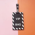 Fashionable black VIP BAG luggage tag with striped border and buckle strap attachment - VIP BAG Slogan / Black