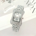Orologio donna argento con strass, cassa tonneau, numeri romani e decorazione floreale - Argento