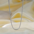 Detailed view of silver titanium steel snake chain necklace on silk and stone background - 25【h1264】 3mm S-chain Necklace Steel Color