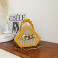 Yellow shell-shaped straw handbag with PU leather trim and gold chain strap accent - Yellow