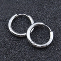 Pair of minimalist silver-colored stainless steel hoop earrings on dark background - 2.5*8mm / Steel