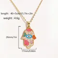 Detailed view of gold Hamsa Hand pendant with colorful enamel eye on O-link chain - Enamel Hamsa Hand Style (Style 5)