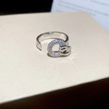 Macro shot of silver panther ring with zircon crystals and open adjustable band - Panther Head Biting Ring Full Zirconia Style (58# Silver)