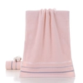 Soft light pink cotton towel with wavy textured border and cotton flowers on white background - Fortune Chain Pink