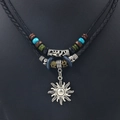 Retro ethnic sun pendant necklace with black woven leather cord and mixed material beads - Sun Pendant Style