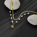 Double-layered gold blade chain necklace with irregular pearls and frosted butterfly pendant - Gold