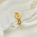 Detail of vintage gold octagonal star ring with zircon inlay and twisted band - Adjustable Open / Gold with White Zirconia