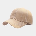 Detailed view of washed khaki baseball cap with distressed holes and contrast stitching - Adjustable / Khaki
