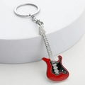 Creative metal guitar keychain with red and black paint finish on a white display stand - Red