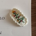 Detail of handmade knit Christmas tree hair clip with white scalloped base and embroidery - Christmas Series - White Oval