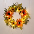 Autumn artificial sunflower wreath with warm LED lights on a white wooden door background - With Warm LED Lights