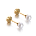 Close-up of pearl stud earrings with polished gold plating and secure disk backings - White Disc / Gold