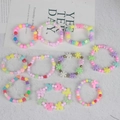 Set aus 11 bunten Perlenarmbändern für Mädchen mit Blumen- und Herzformen - A13 Bunte Perlenarmband