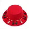 Detailed view of red flat top hat with colorful tassels and bohemian style beads - M(56-58cm) / Red