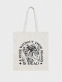 Detalle de bolsa de lona con ilustración de dragón y cita de texto negra impresa - Cita de Cabeza de Dragón