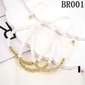 Close-up of a 3-piece white crystal bead bracelet set with adjustable woven gold drawstring - One Size / White