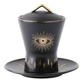 Black ceramic candle jar with lid featuring gold Evil Eye pattern and starburst lines - Black Eye Sugar Pot + Tray