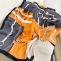 Elegant silk scarf featuring horse harness pattern in orange, grey and cream tones - Leather Buckle