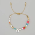 Pink evil eye bead bracelet with white freshwater pearls and golden O letter charm - Letter O Multi-element Bracelet (ZZ-B24061901O-F)