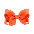 Vibrant orange ribbon bow hair clip made of high-quality grosgrain fabric on white background - Bright Orange