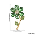 Green crystal flower brooch with gold alloy stem and detailed rhinestones in a 5.9cm size - XD824277 Green Crystal Flower