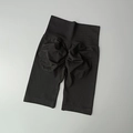 Detalle de pantalones cortos de gimnasia sin costuras negros con cintura alta y push up - S / Negro