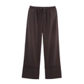 Detail of dark brown linen trousers with drawstring elastic waist and wide folded hems - Coffee Pants