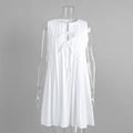 Detailed close-up of the pleats and double bow ties on the white sleeveless dress - S / White