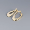 Elegant s925 silver oval hollow earrings with a polished golden finish and ear buckle - 925 Silver / Gold
