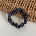 Deep grey satin scrunchie hair tie with silky pleated texture for women styling - Black