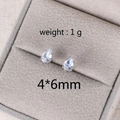 Detailed view of silver pear-cut zircon stud earrings in a box with 1g weight and 4x6mm size - 6MM Water Drop Platinum