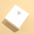 White cardstock earring display card with multi-hole pattern and black smiley face - 9*9cm (12 Holes)