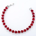 Detailed view of the red heart-shaped gemstone bracelet with silver metal setting - Silver Magenta Zirconia Bracelet
