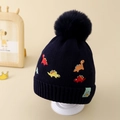 Close-up of kids navy knit beanie with colorful dinosaur embroidery and faux fur pompom - Approx. 3-8 Years / Black