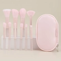 Set of 10 soft pink makeup brushes with matching PU leather bag on beige background - 10 Pcs Transparent Handle Oil-Spayed Tube + Pink Bag