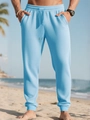 Close-up of light blue waffle knit joggers showing fabric texture and drawstring waist - Sky Blue