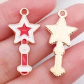 DIY enamel magic wand charms in gold and red finish for jewelry making projects - Red Star Magic Wand (12304)